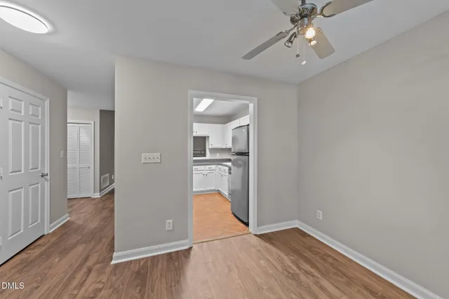 a kitchen with a sink cabinets and appliances