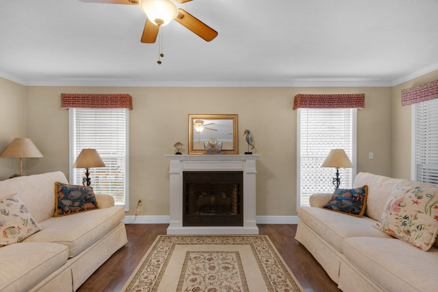 44 Dolphin Place Freeport, FL 32439 - Photo 11 of 76 a living room with furniture and a fireplace