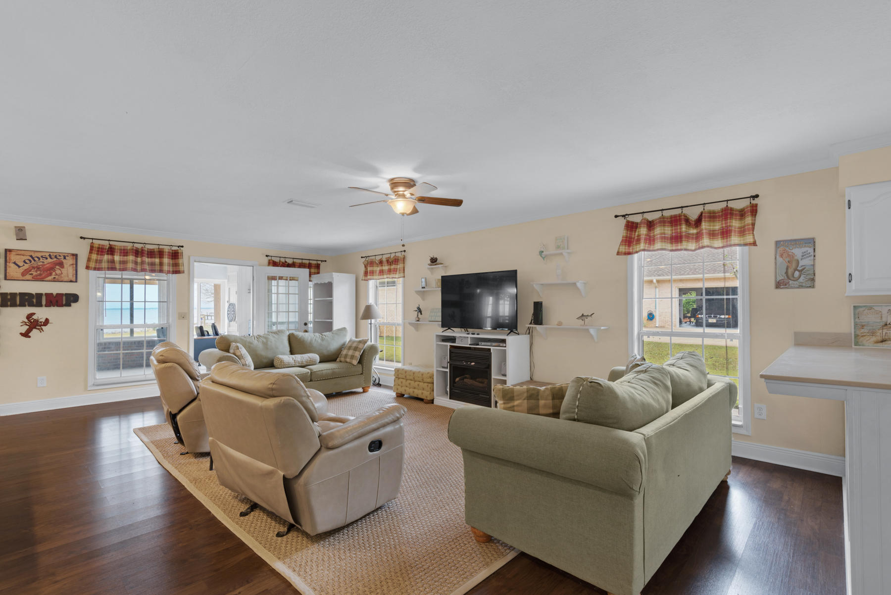 44 Dolphin Place Freeport, FL 32439 - Photo 15 of 76 a living room with furniture and a flat screen tv