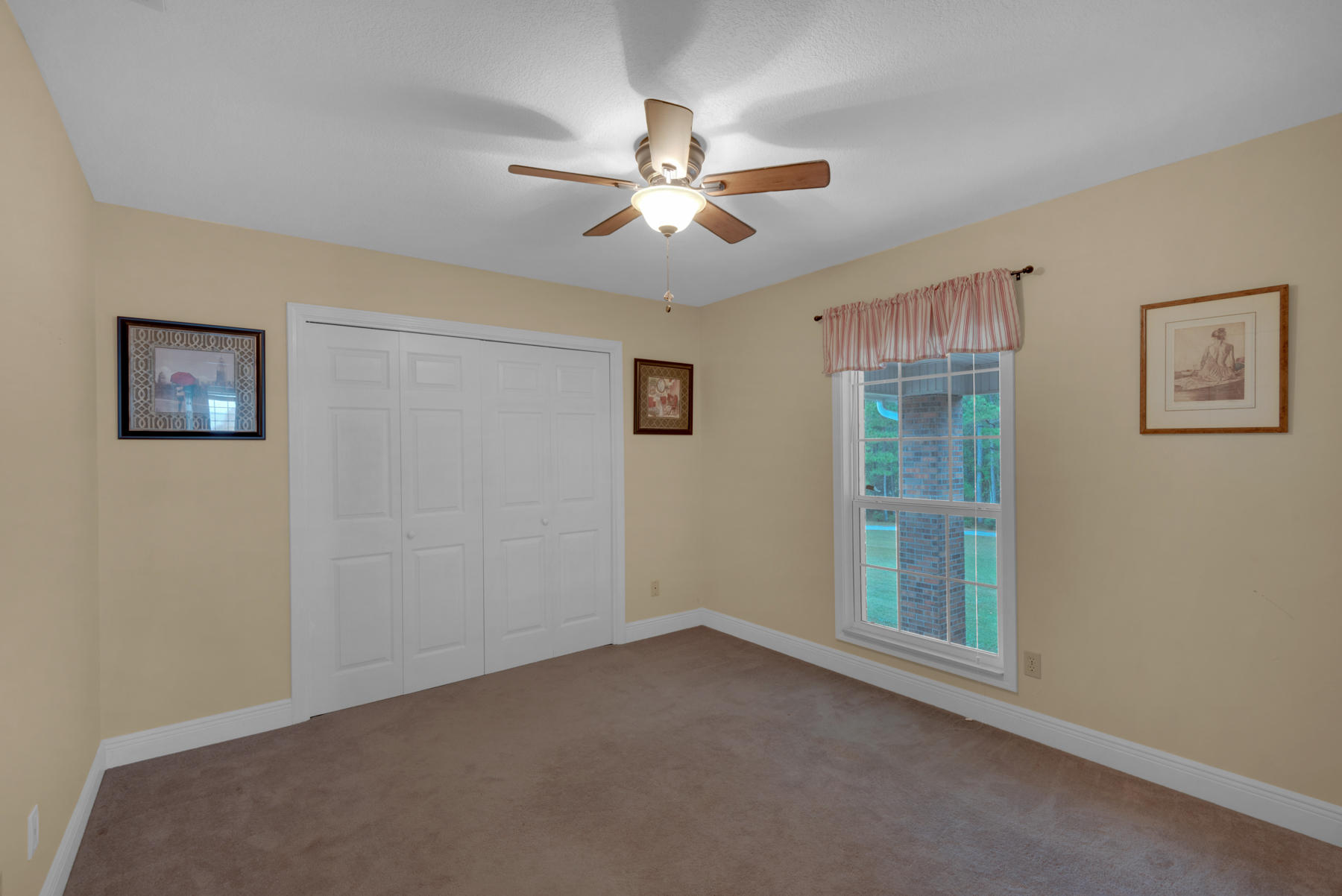 44 Dolphin Place Freeport, FL 32439 - Photo 27 of 76 a view of an empty room with a window