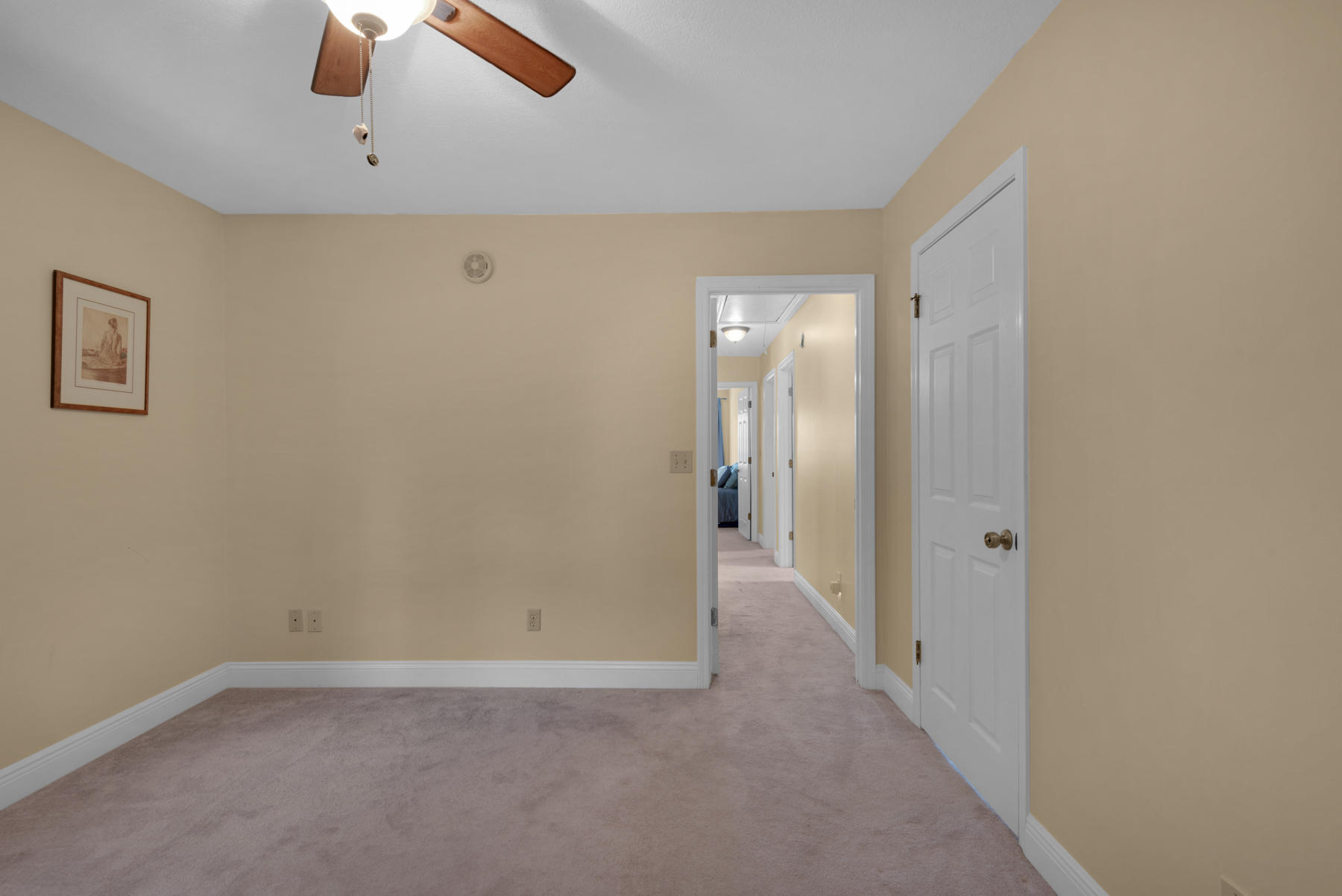 44 Dolphin Place Freeport, FL 32439 - Photo 28 of 76 an empty room with a empty space and a ceiling fan