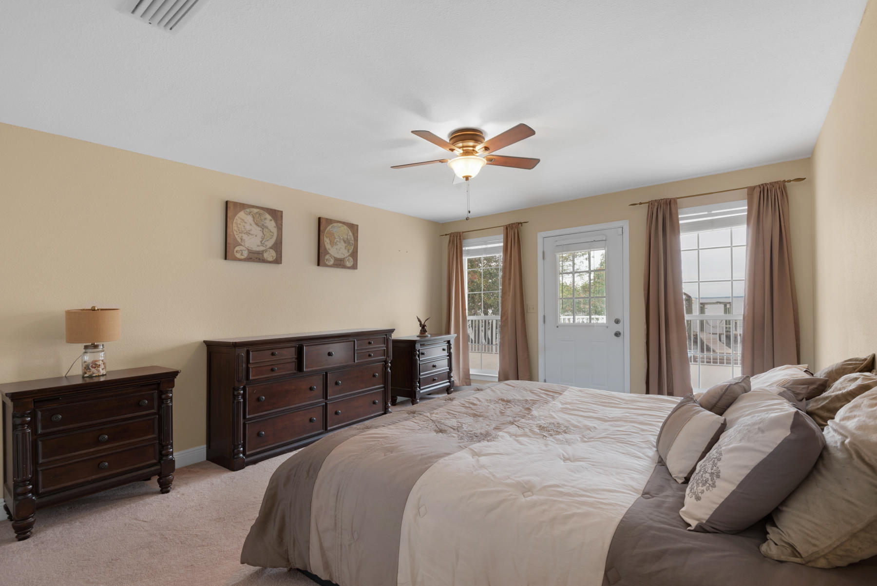 44 Dolphin Place Freeport, FL 32439 - Photo 31 of 76 a bedroom with a bed and a dresser