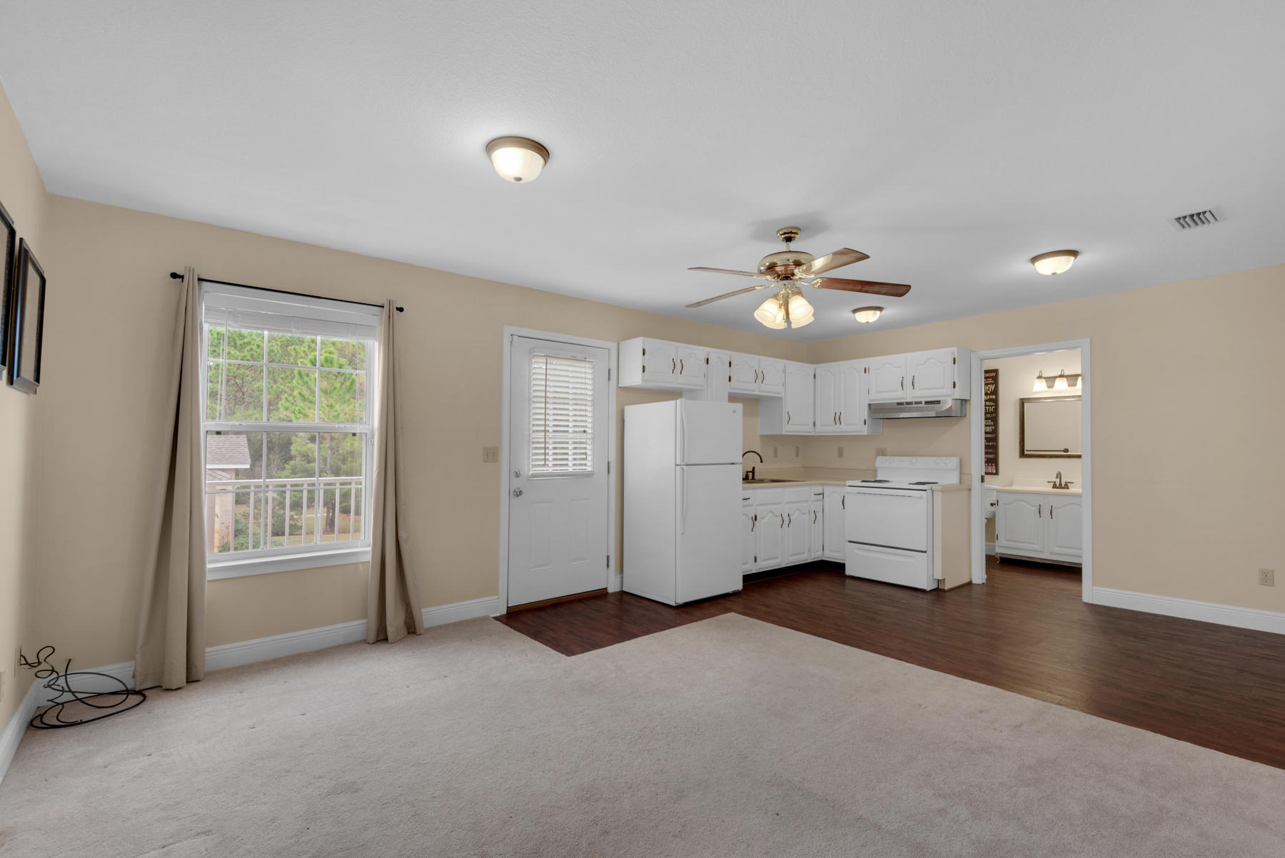 44 Dolphin Place Freeport, FL 32439 - Photo 36 of 76 a view of a livingroom with furniture and a ceiling fan