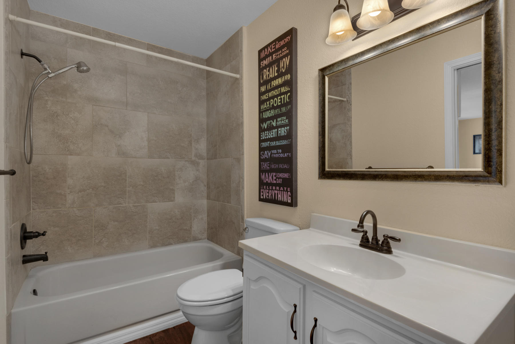 44 Dolphin Place Freeport, FL 32439 - Photo 41 of 76 a bathroom with a sink a toilet and shower