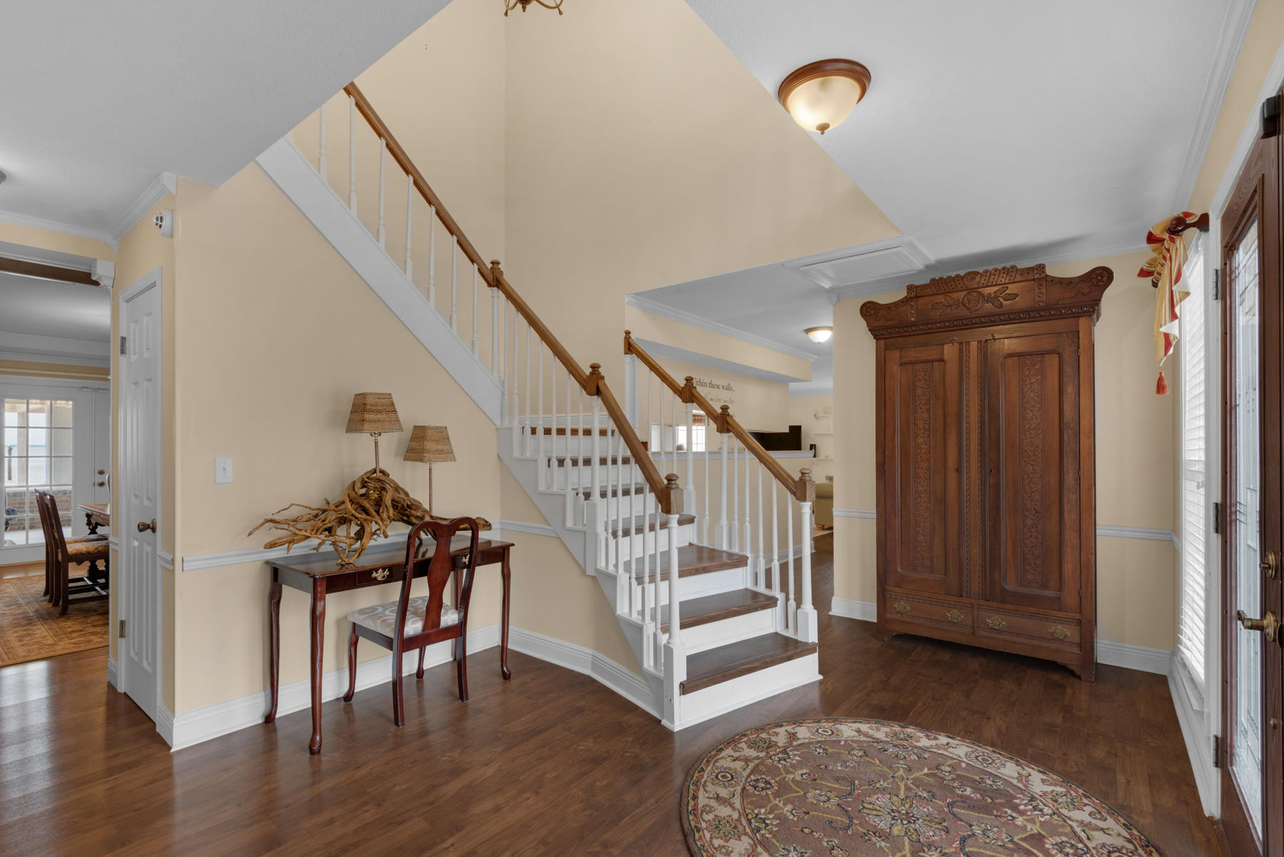 44 Dolphin Place Freeport, FL 32439 - Photo 6 of 76 a view of entryway with wooden floor