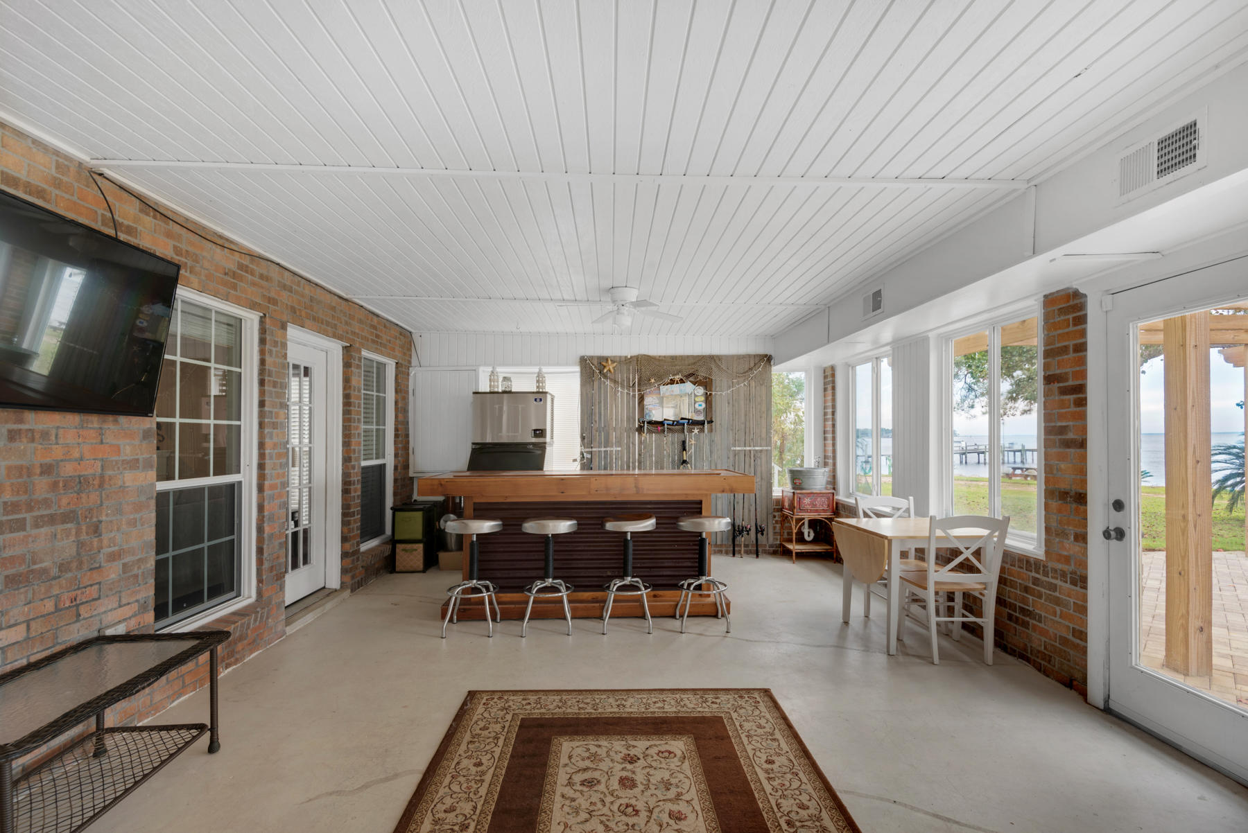 44 Dolphin Place Freeport, FL 32439 - Photo 64 of 76 a view of a dining room with furniture window and outside view