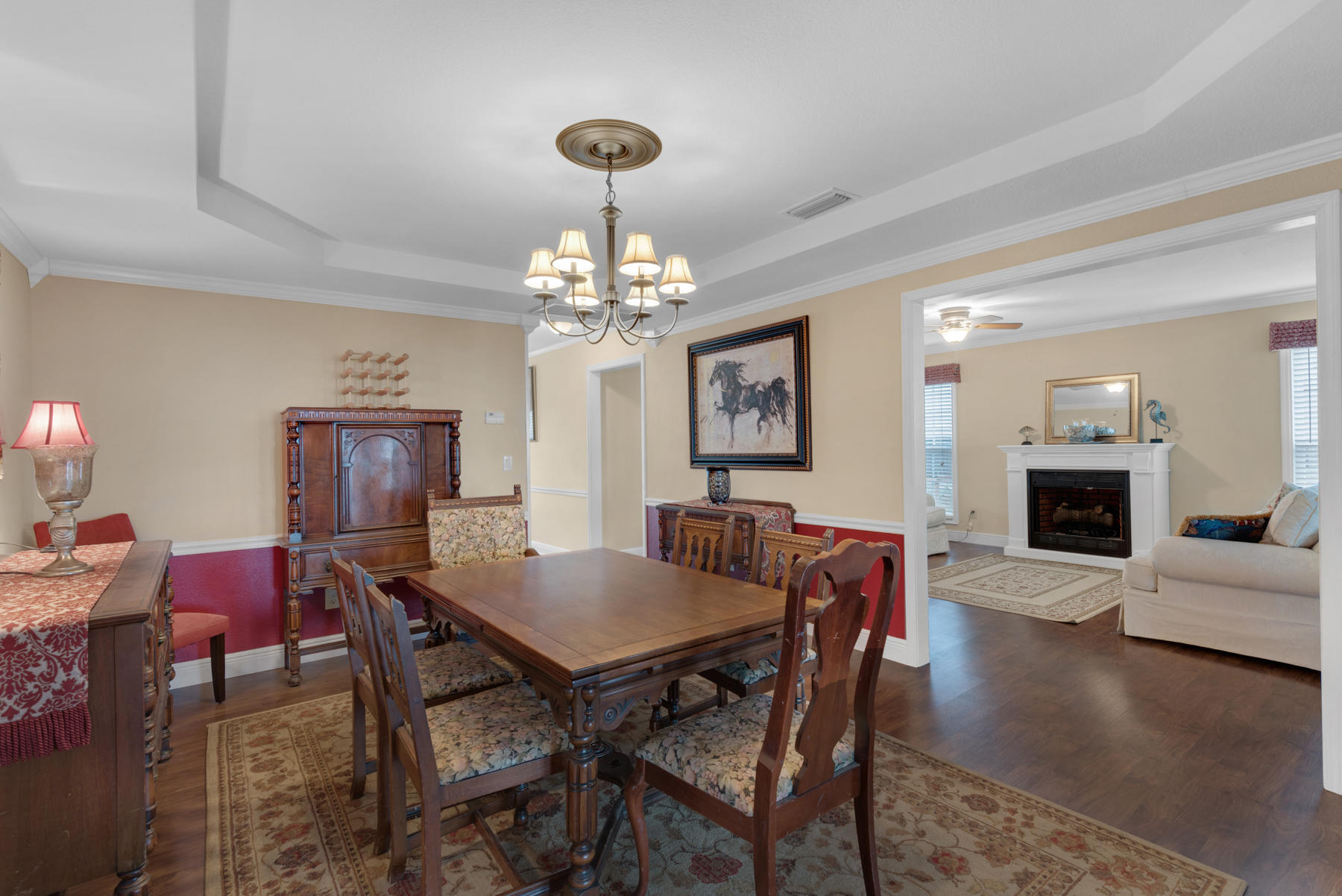 44 Dolphin Place Freeport, FL 32439 - Photo 7 of 76 a view of a dining room with furniture and wooden floor