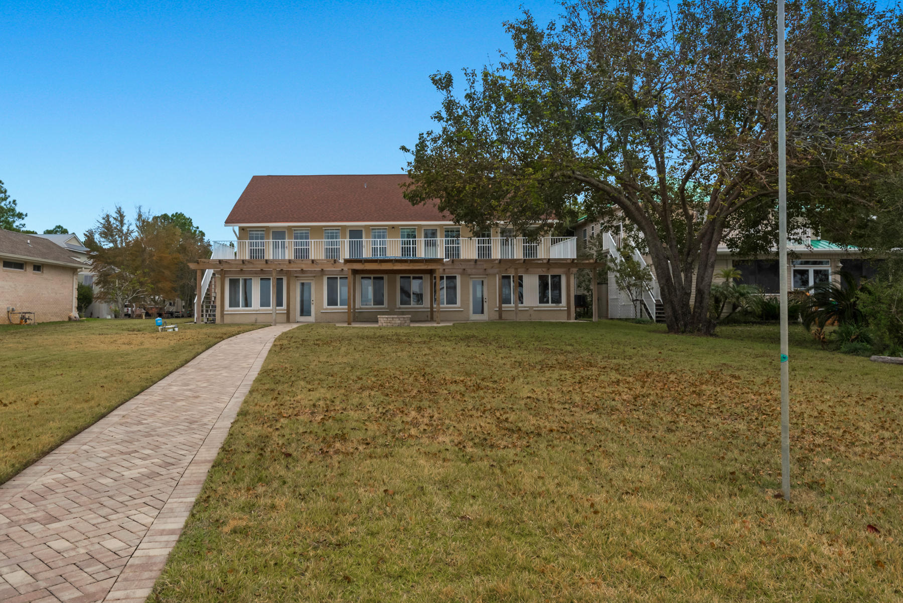 44 Dolphin Place Freeport, FL 32439 - Photo 74 of 76 a view of a house with a yard