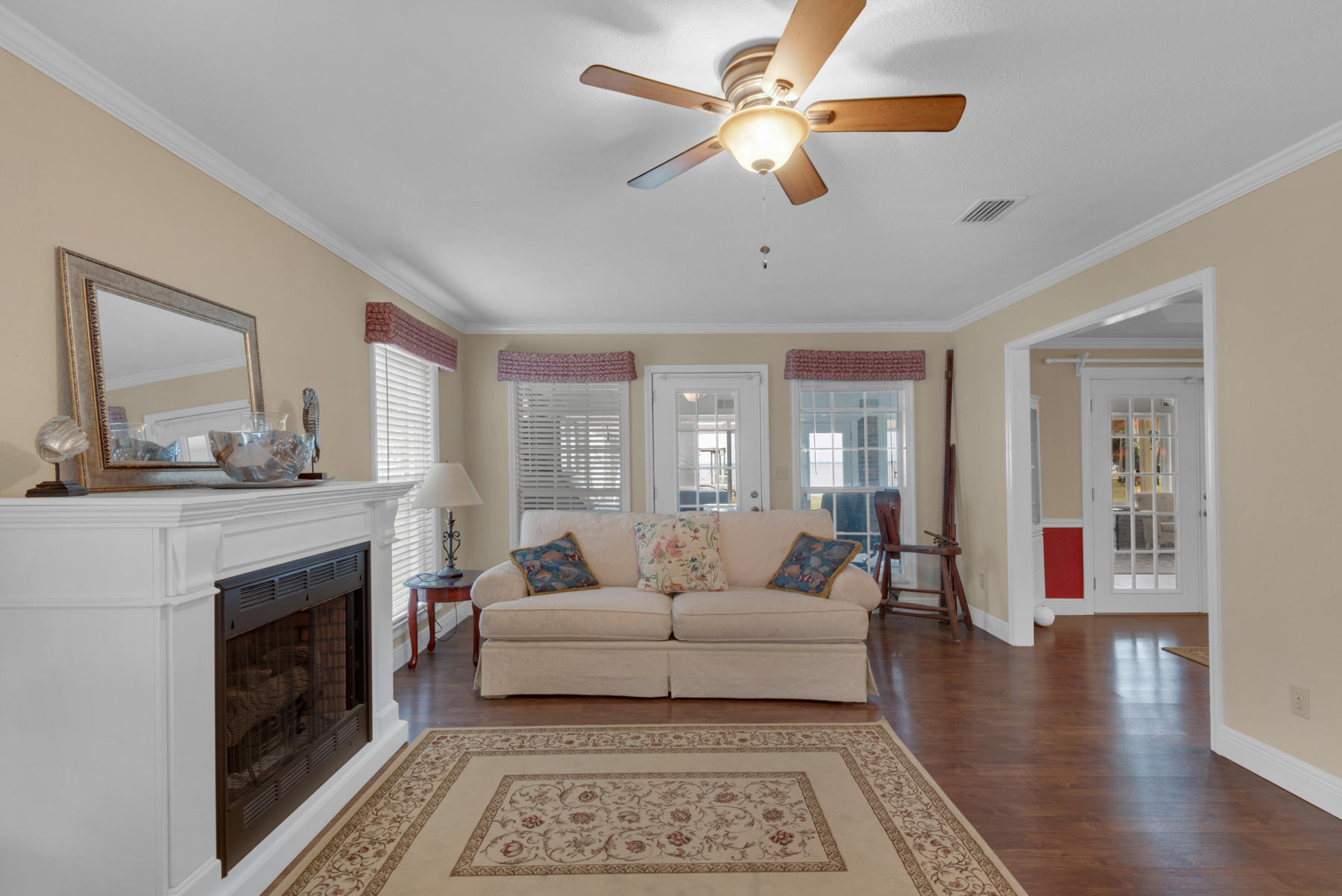 44 Dolphin Place Freeport, FL 32439 - Photo 9 of 76 a living room with furniture and a fireplace
