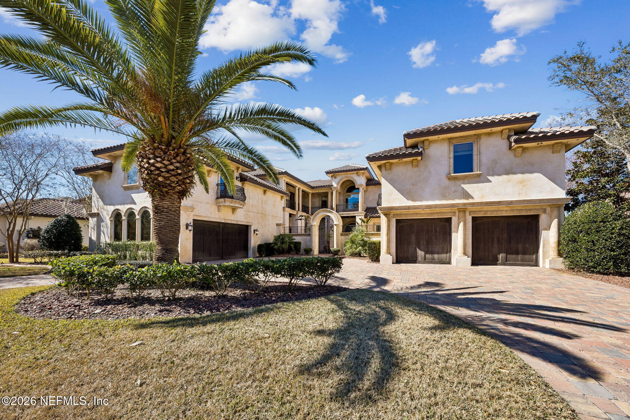 a view of a house with couches in the patio