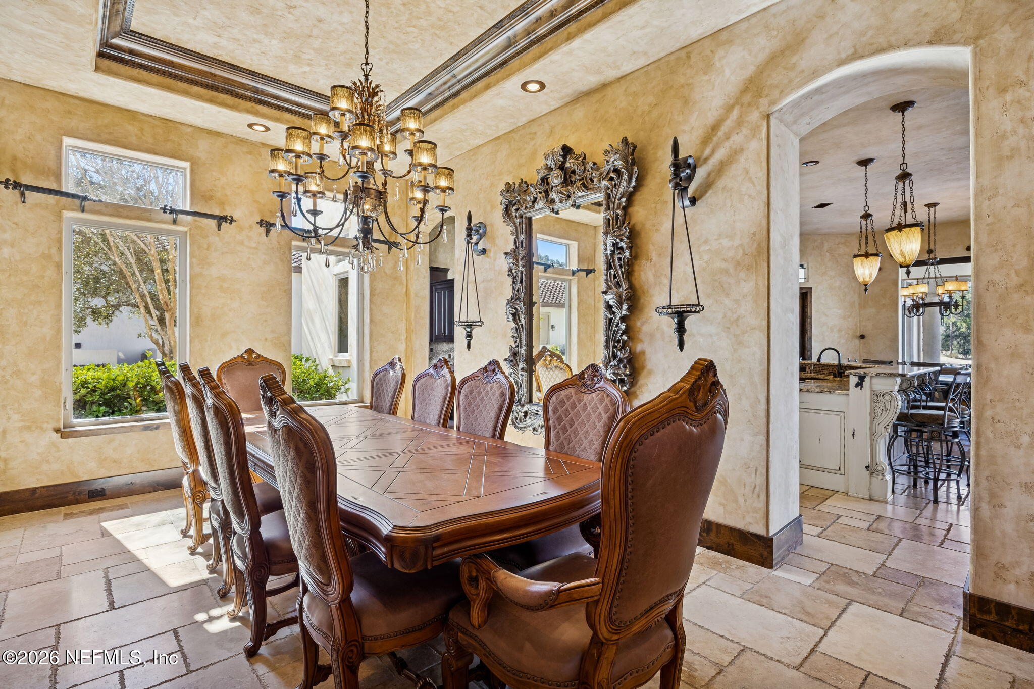 3533 Crest Street St. Augustine, FL 32092 - Photo 26 of 79 a view of a dining room with furniture and a chandelier