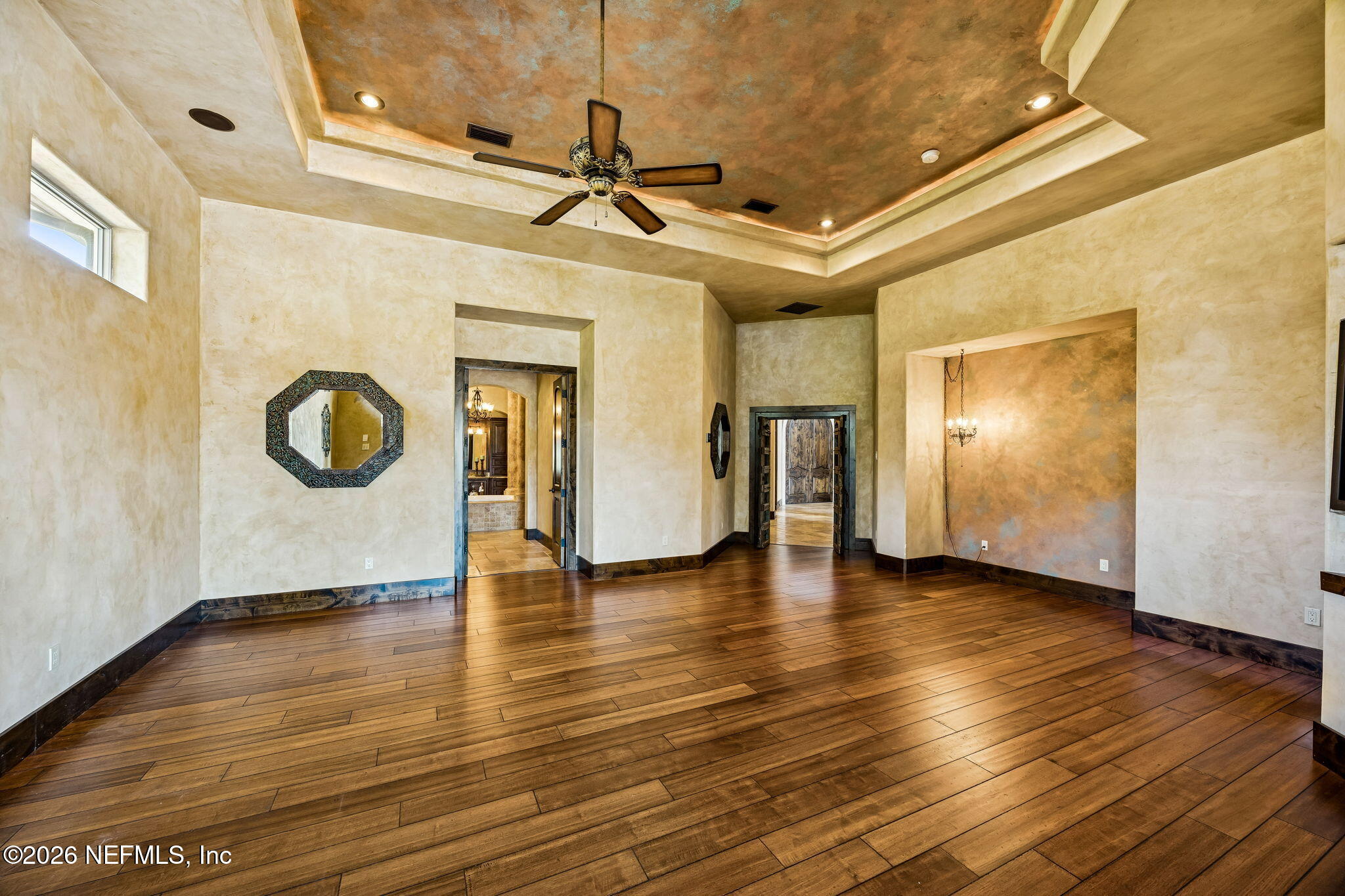 3533 Crest Street St. Augustine, FL 32092 - Photo 36 of 79 a view of an empty room with window and wooden floor