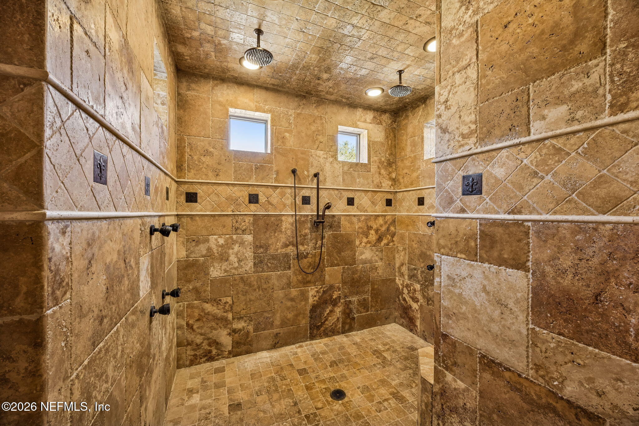 3533 Crest Street St. Augustine, FL 32092 - Photo 40 of 79 a bathroom with a shower