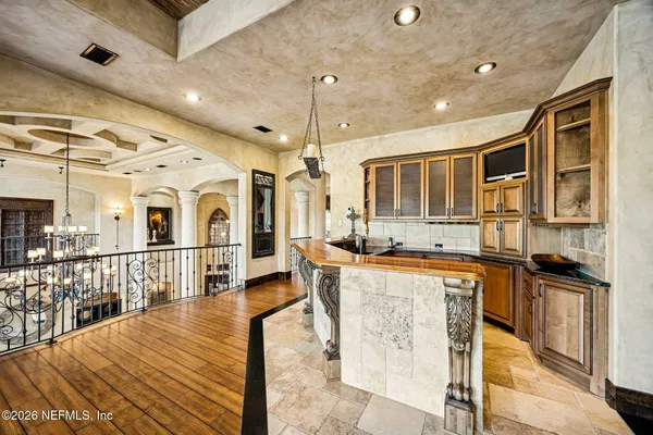 a view of living room with furniture and floor to ceiling window