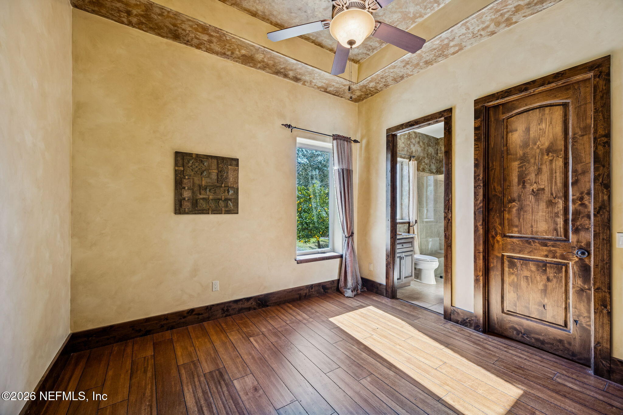 3533 Crest Street St. Augustine, FL 32092 - Photo 47 of 79 wooden floor in an empty room with a window