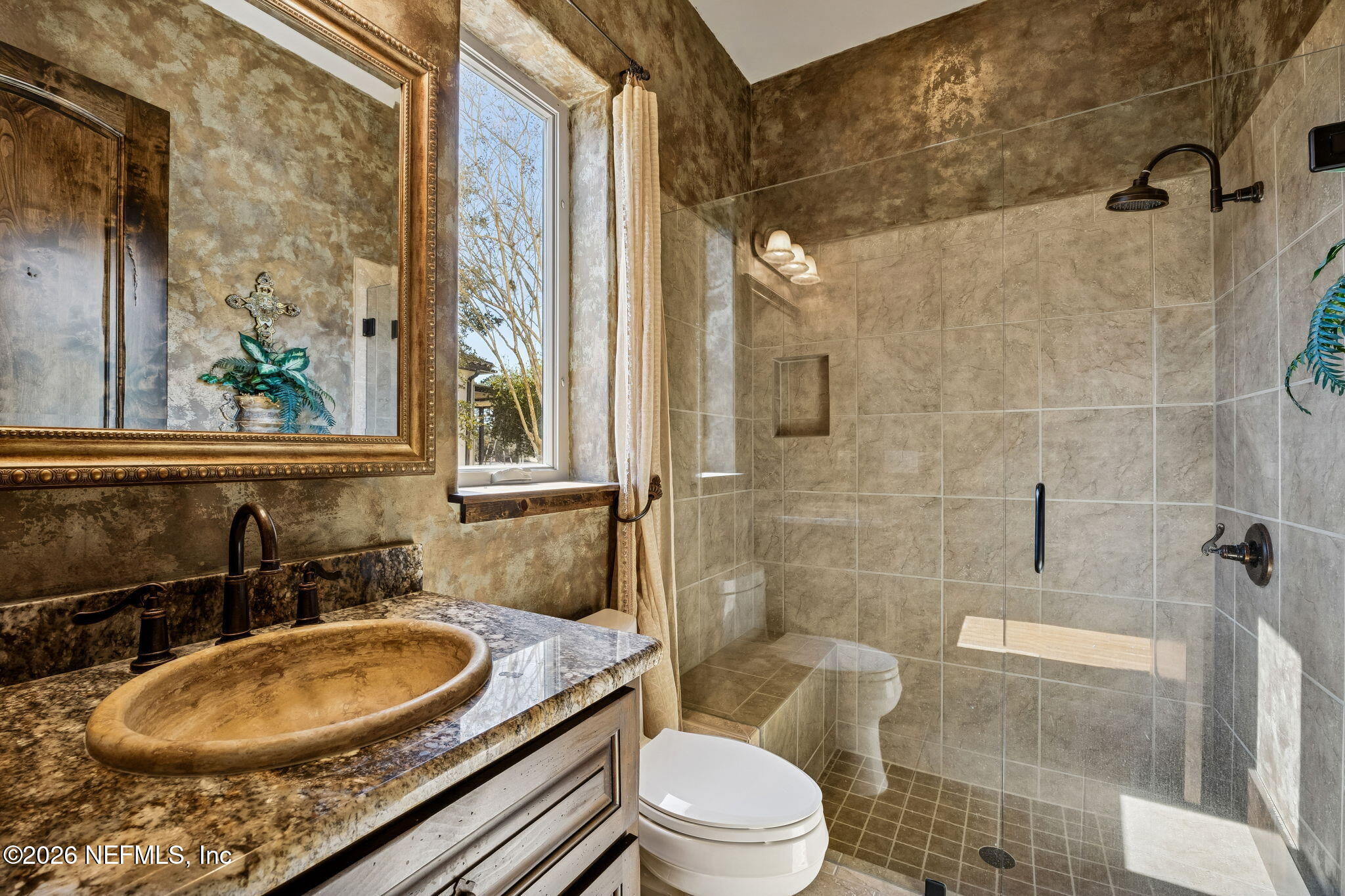 3533 Crest Street St. Augustine, FL 32092 - Photo 49 of 79 a bathroom with a sink toilet and shower