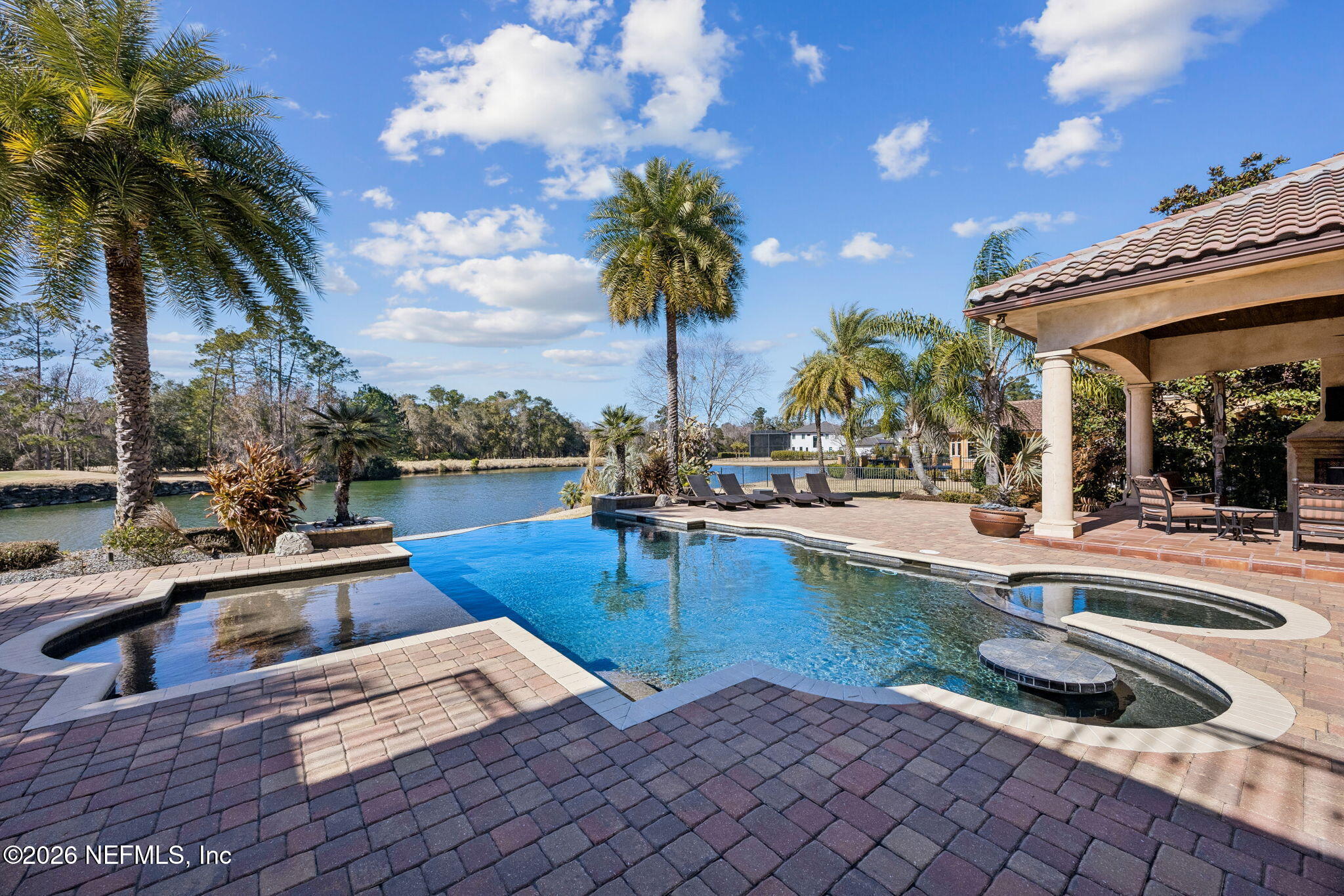 3533 Crest Street St. Augustine, FL 32092 - Photo 5 of 79 a view of a swimming pool with a lounge chairs