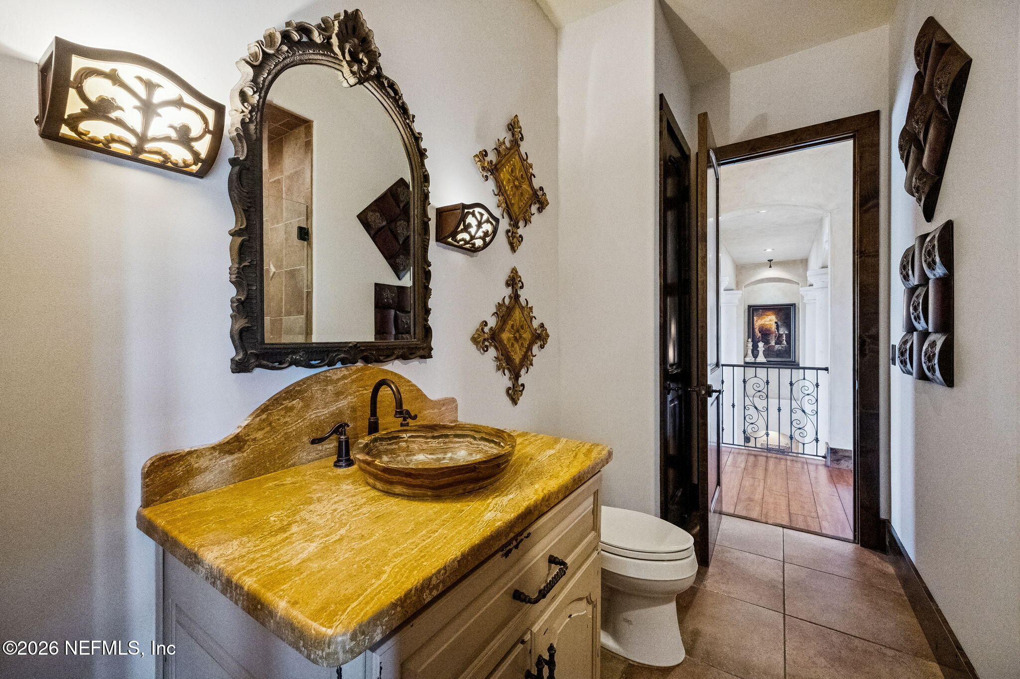 3533 Crest Street St. Augustine, FL 32092 - Photo 51 of 79 a bathroom with a sink a toilet and shower curtain
