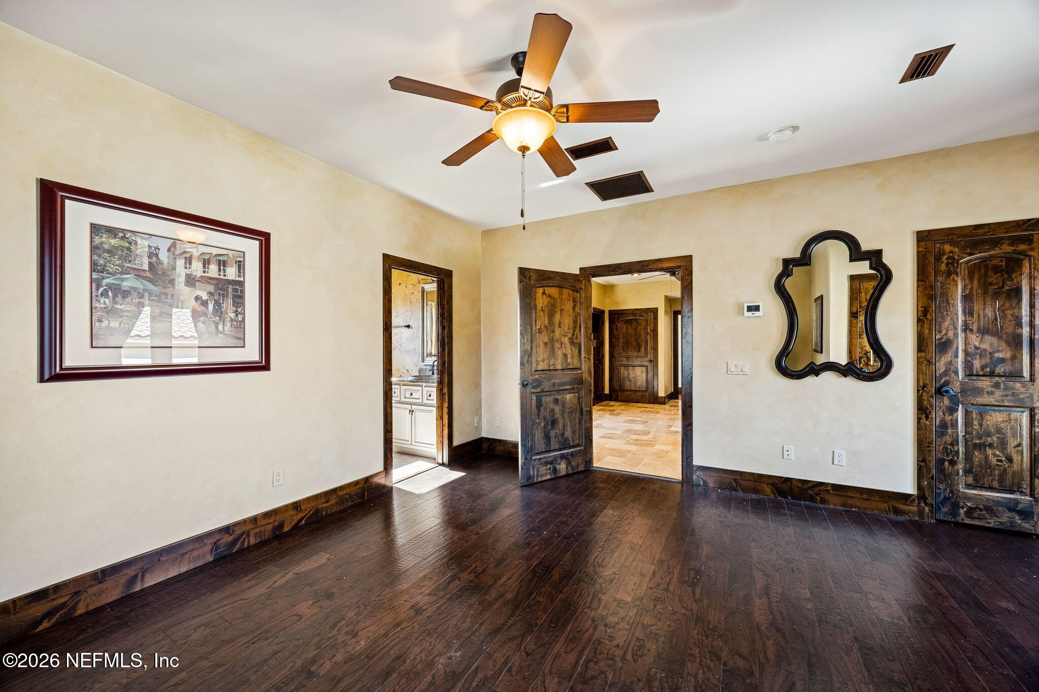 3533 Crest Street St. Augustine, FL 32092 - Photo 58 of 79 a view of an empty room with wooden floor