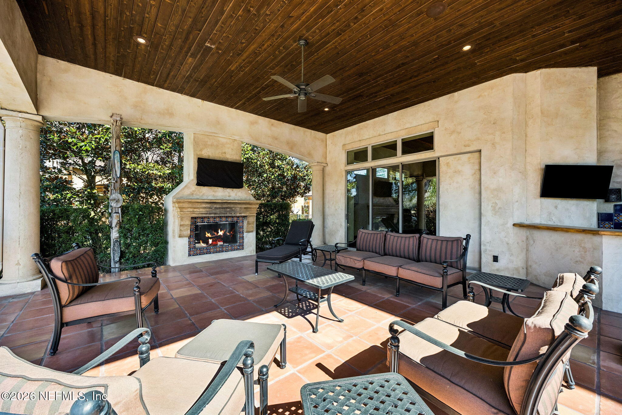 3533 Crest Street St. Augustine, FL 32092 - Photo 70 of 79 a outdoor space with patio furniture and a fireplace