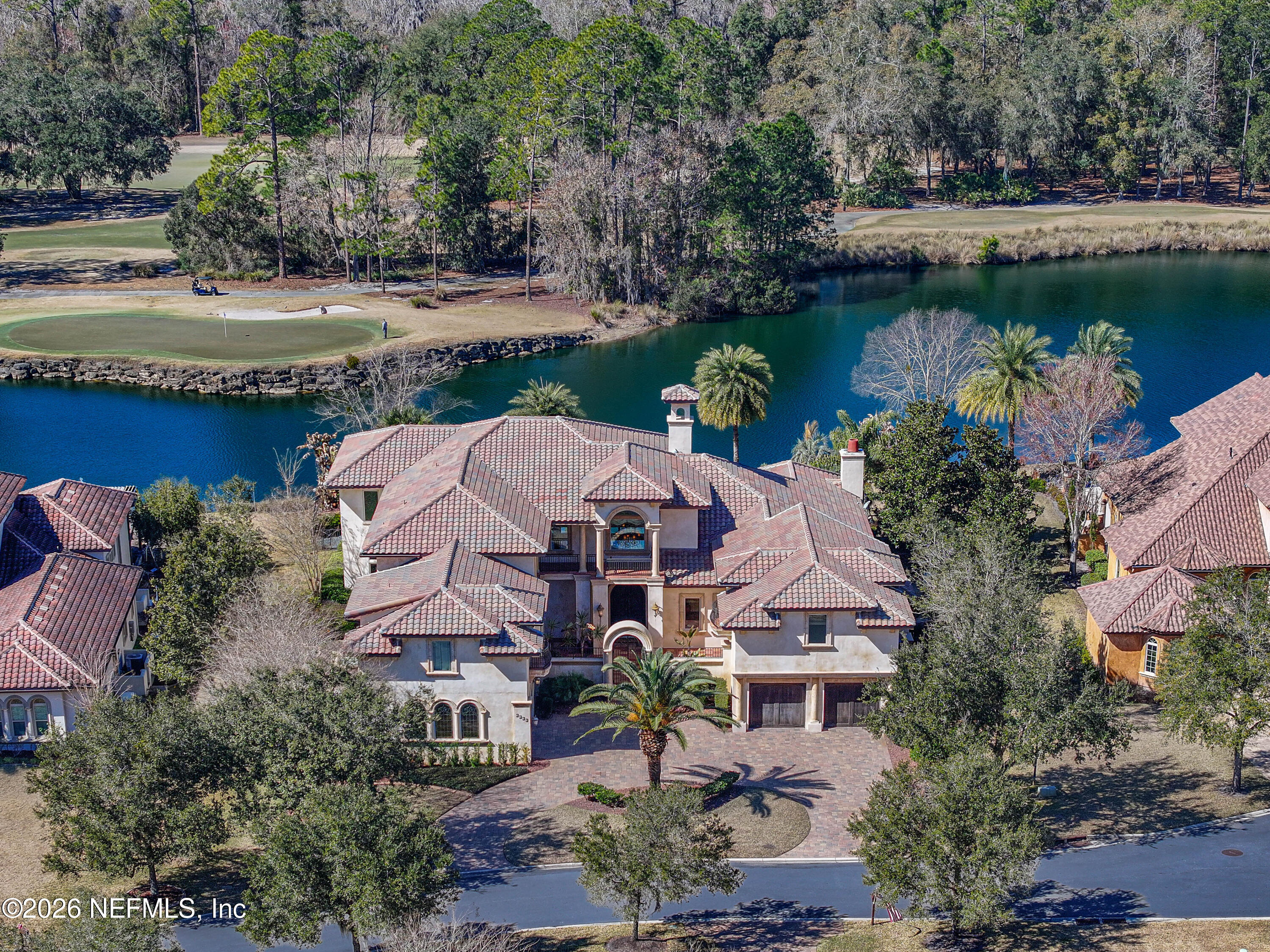 3533 Crest Street St. Augustine, FL 32092 - Photo 73 of 79 an aerial view of a house with a garden and lake view
