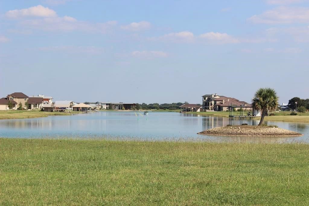 510 River Ranch Circle Martindale, TX 78655 - Photo 15 of 20 a view of a lake with houses