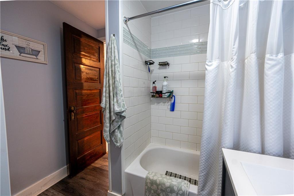 162 Conestoga Road Pittsburgh, PA 15235 - Photo 11 of 25 a bathroom with a tub and a shower