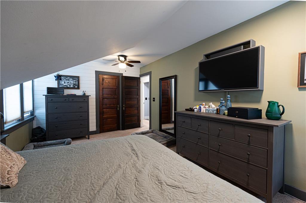 162 Conestoga Road Pittsburgh, PA 15235 - Photo 18 of 25 a room with a bed and a flat screen tv