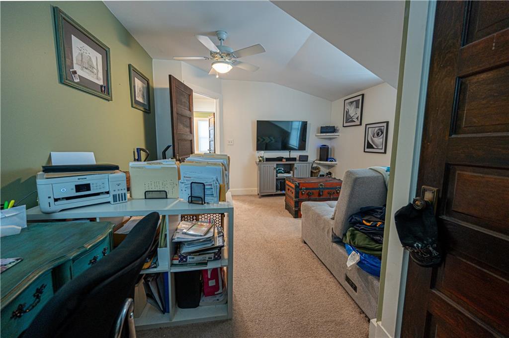 162 Conestoga Road Pittsburgh, PA 15235 - Photo 21 of 25 a living room with furniture and a flat screen tv
