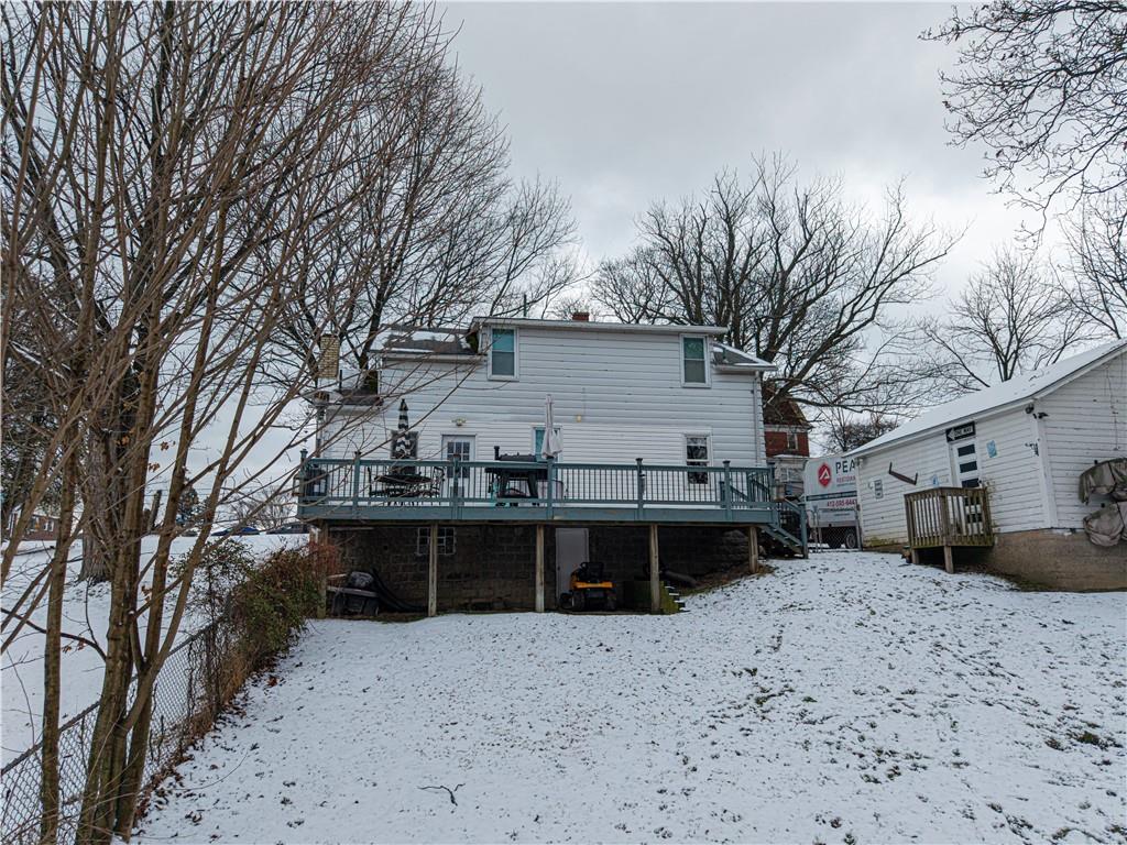 162 Conestoga Road Pittsburgh, PA 15235 - Photo 24 of 25 a view of a house with a yard covered in snow