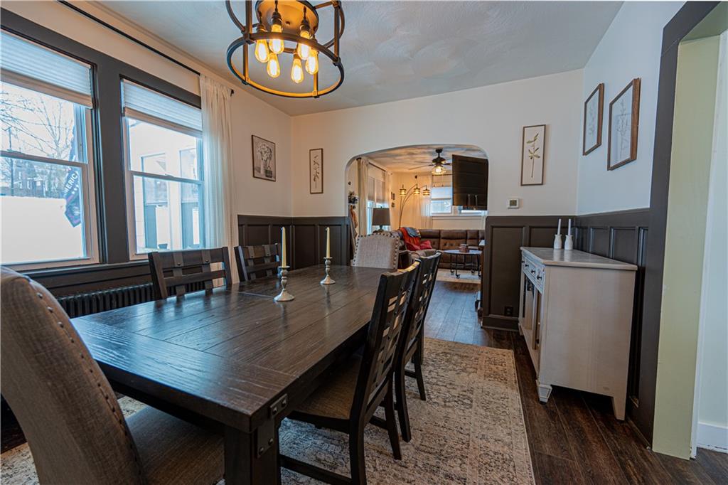 162 Conestoga Road Pittsburgh, PA 15235 - Photo 7 of 25 a dining room with furniture a mirror and wooden floor