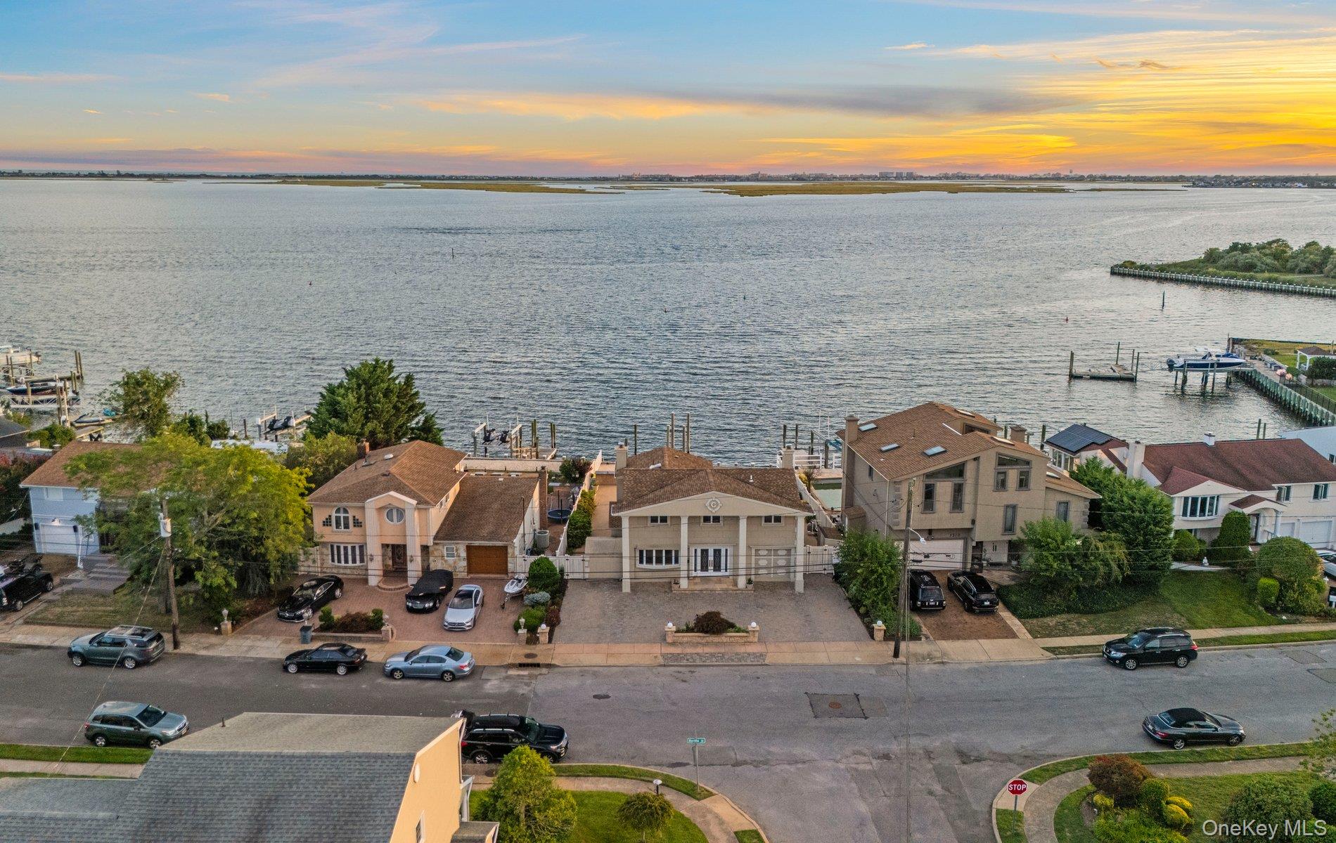 Aerial view at dusk of a residential view and a water view