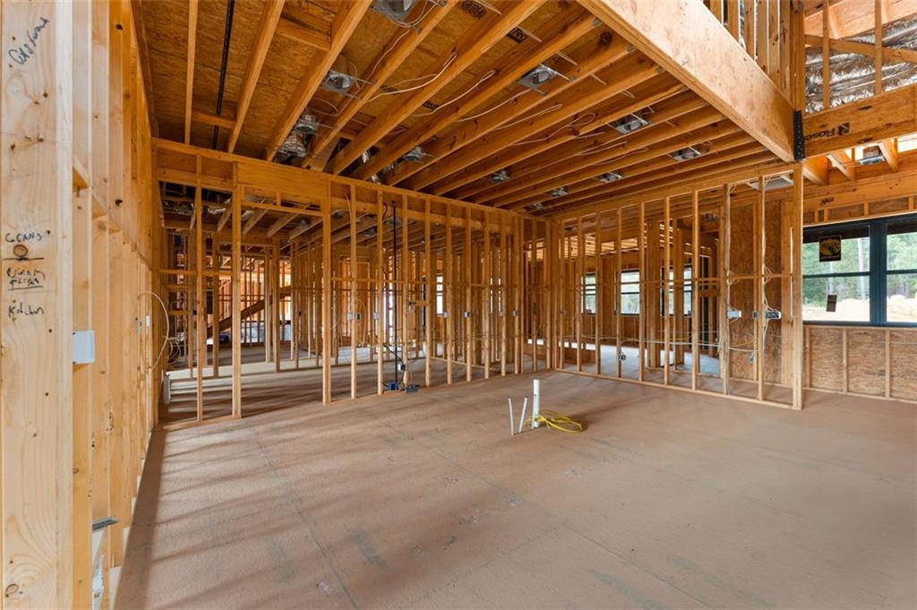 1921 Euharlee Road Kingston, GA 30145 - Photo 17 of 71 a view of a patio with table and chairs and potted plants