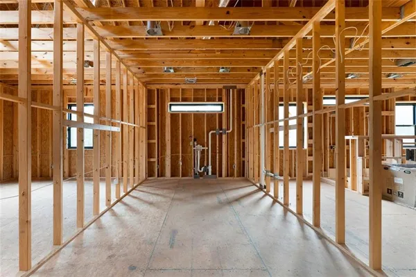 a view of an empty room with windows