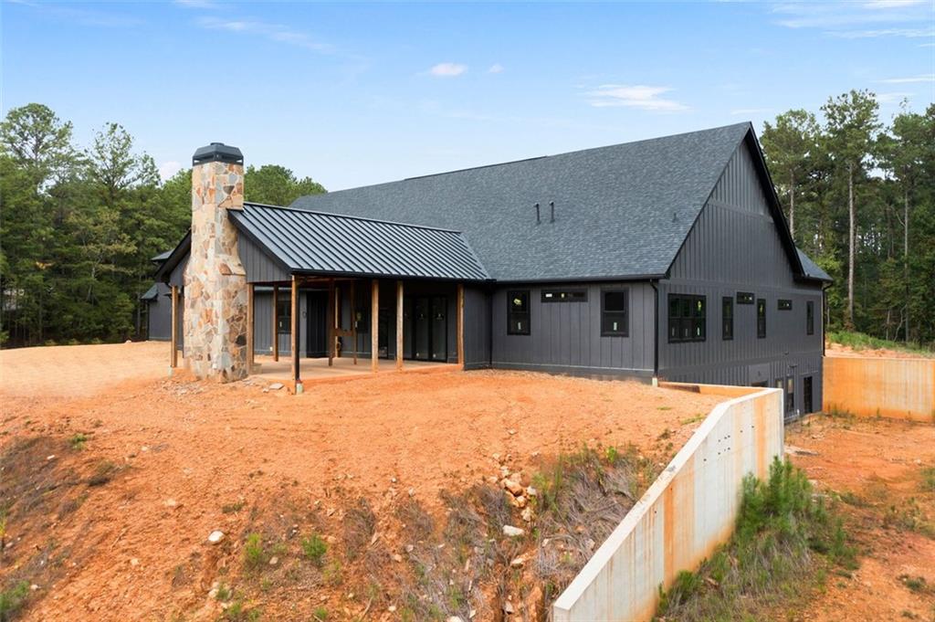 1921 Euharlee Road Kingston, GA 30145 - Photo 58 of 71 a front view of a house with a yard and garage