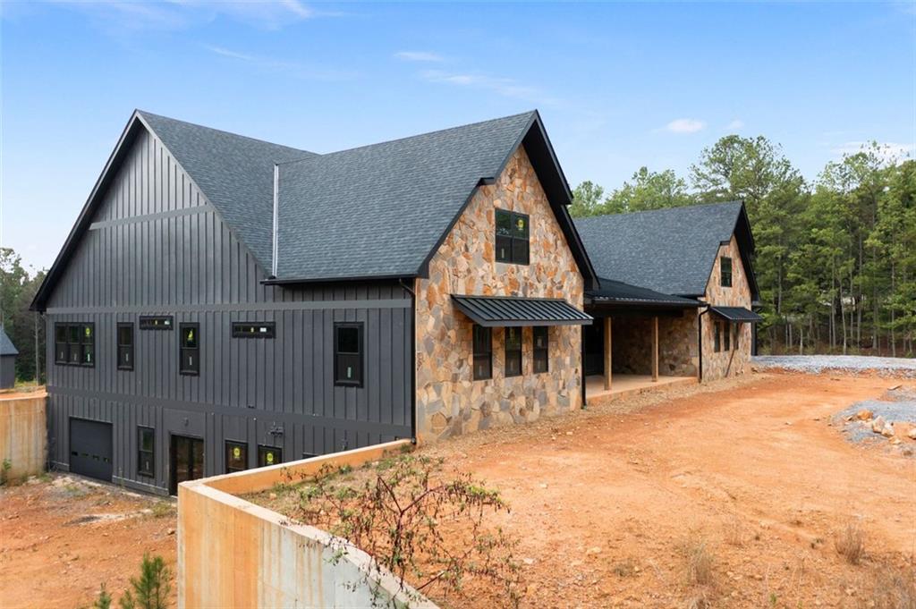 1921 Euharlee Road Kingston, GA 30145 - Photo 6 of 71 a front view of a house with a yard