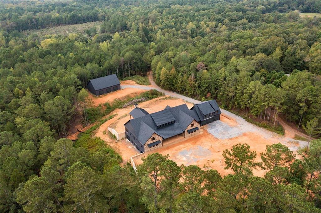1921 Euharlee Road Kingston, GA 30145 - Photo 70 of 71 an aerial view of a house with yard