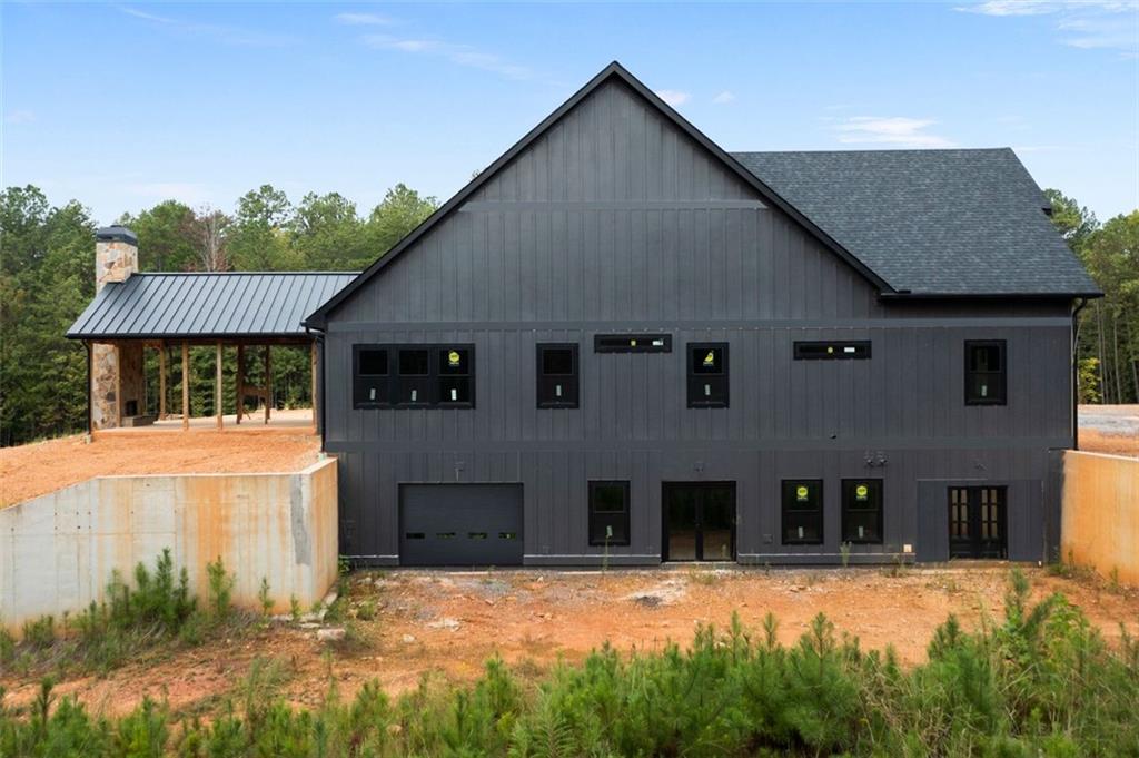 1921 Euharlee Road Kingston, GA 30145 - Photo 7 of 71 a front view of a house with a yard