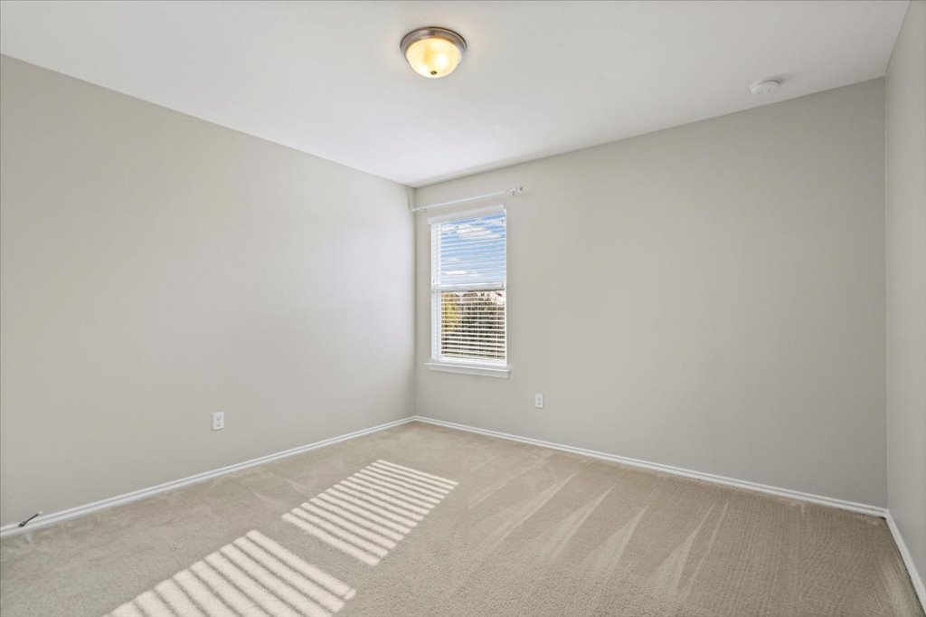 11229 Kirkland Hill Path Austin, TX 78754 - Photo 6 of 15 Carpeted secondary bedrooms