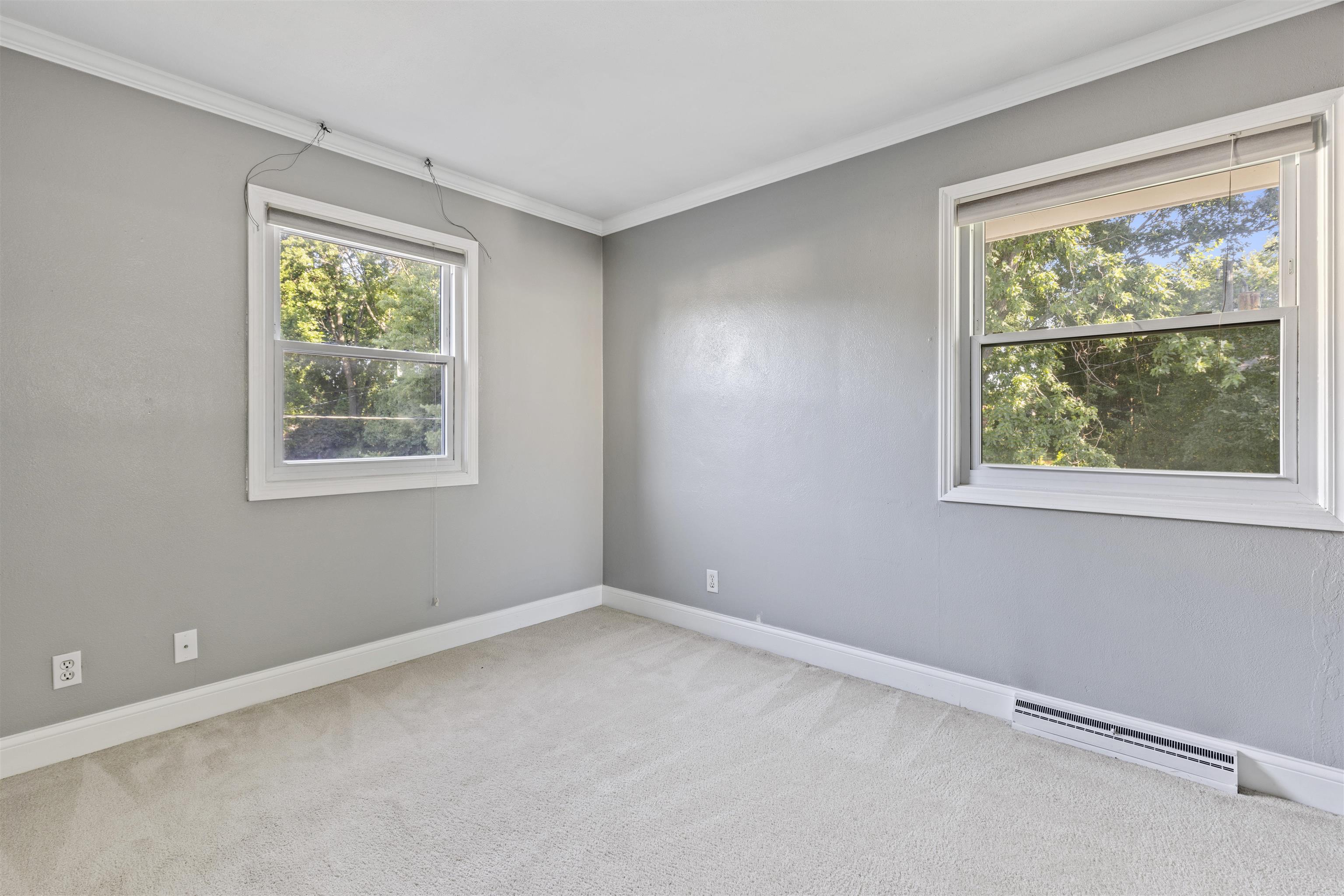 4976 Brigadoon Road Rockford, IL 61107 - Photo 13 of 32 a view of an empty room with a window