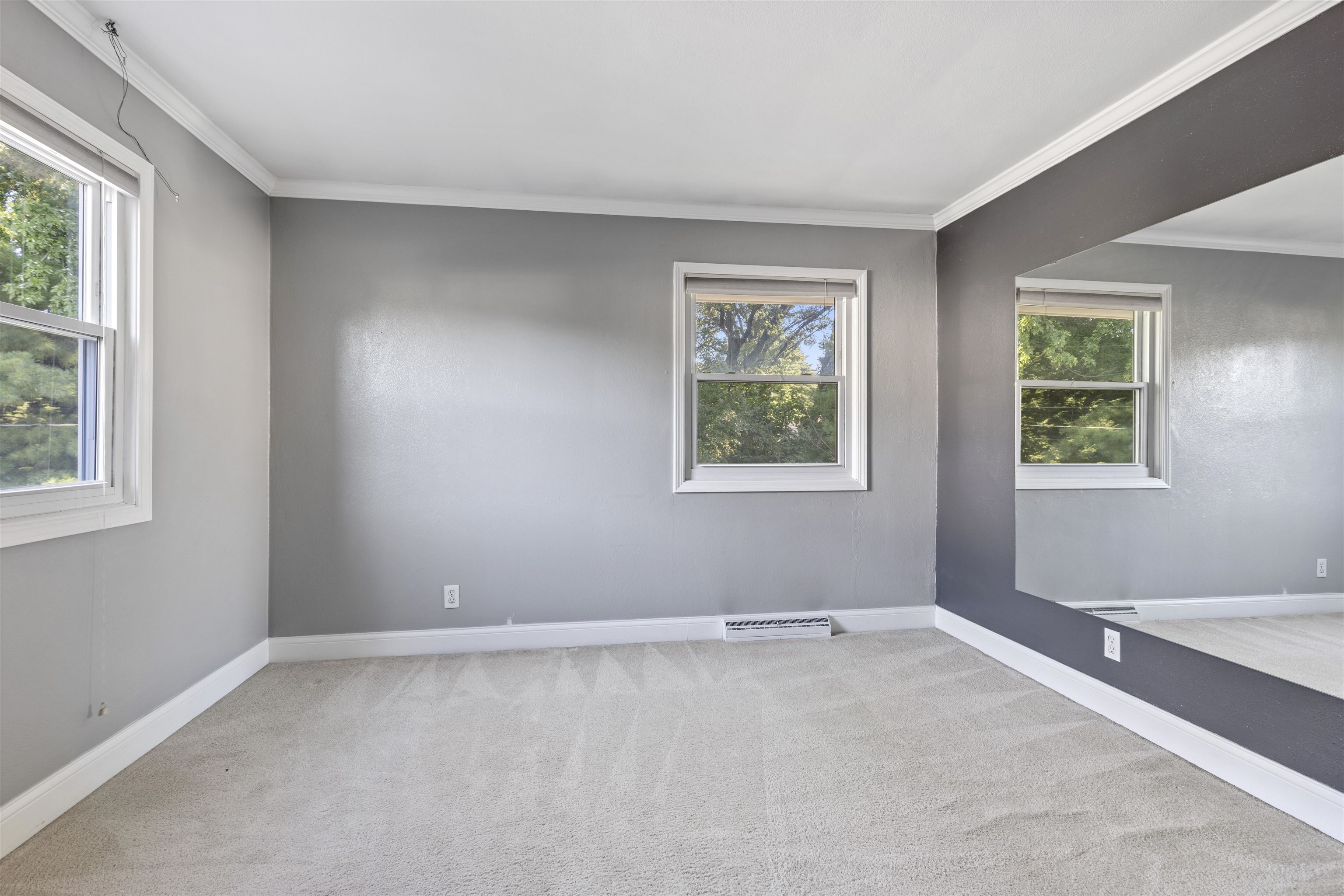 4976 Brigadoon Road Rockford, IL 61107 - Photo 14 of 32 an empty room with windows