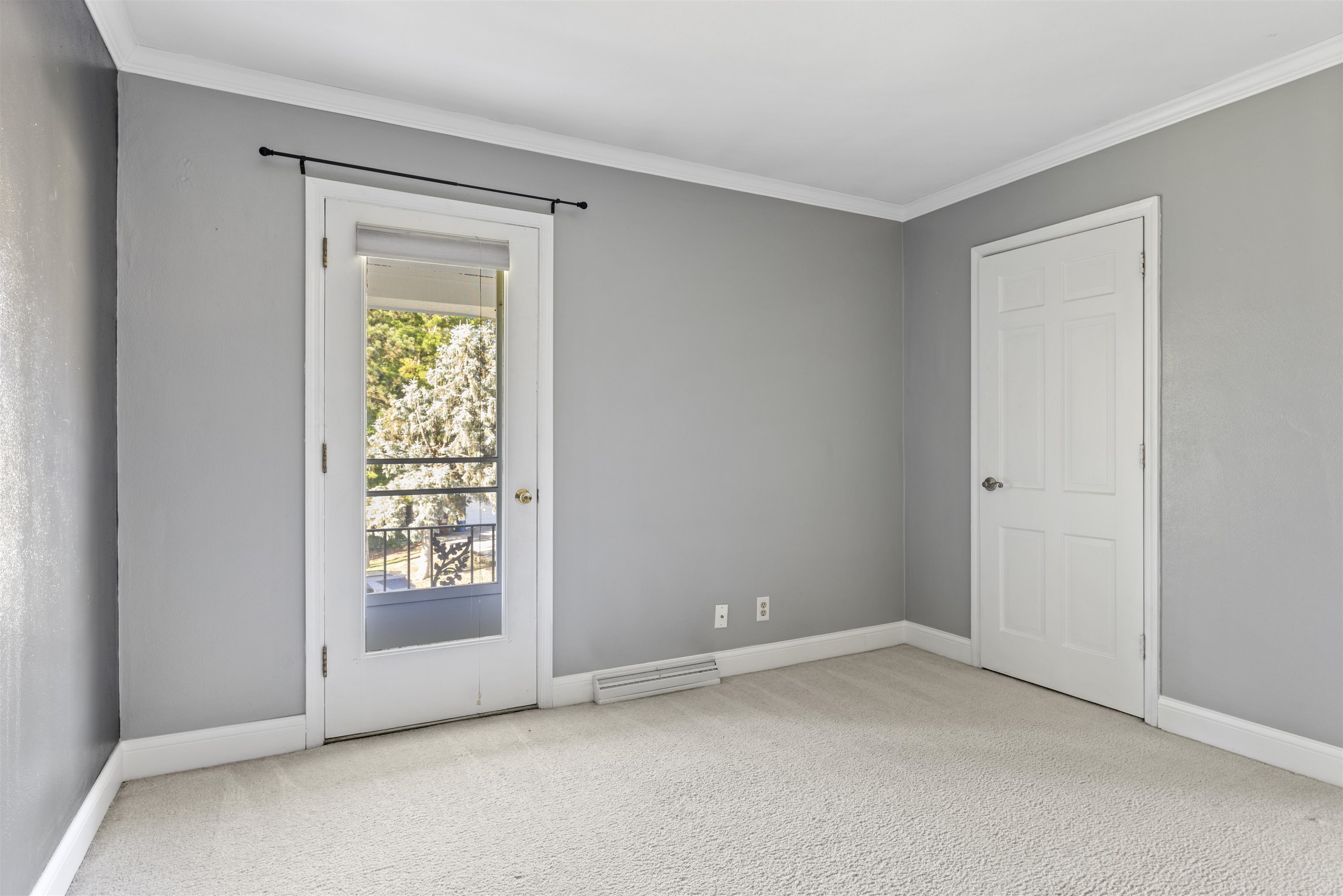 4976 Brigadoon Road Rockford, IL 61107 - Photo 17 of 32 an empty room with windows