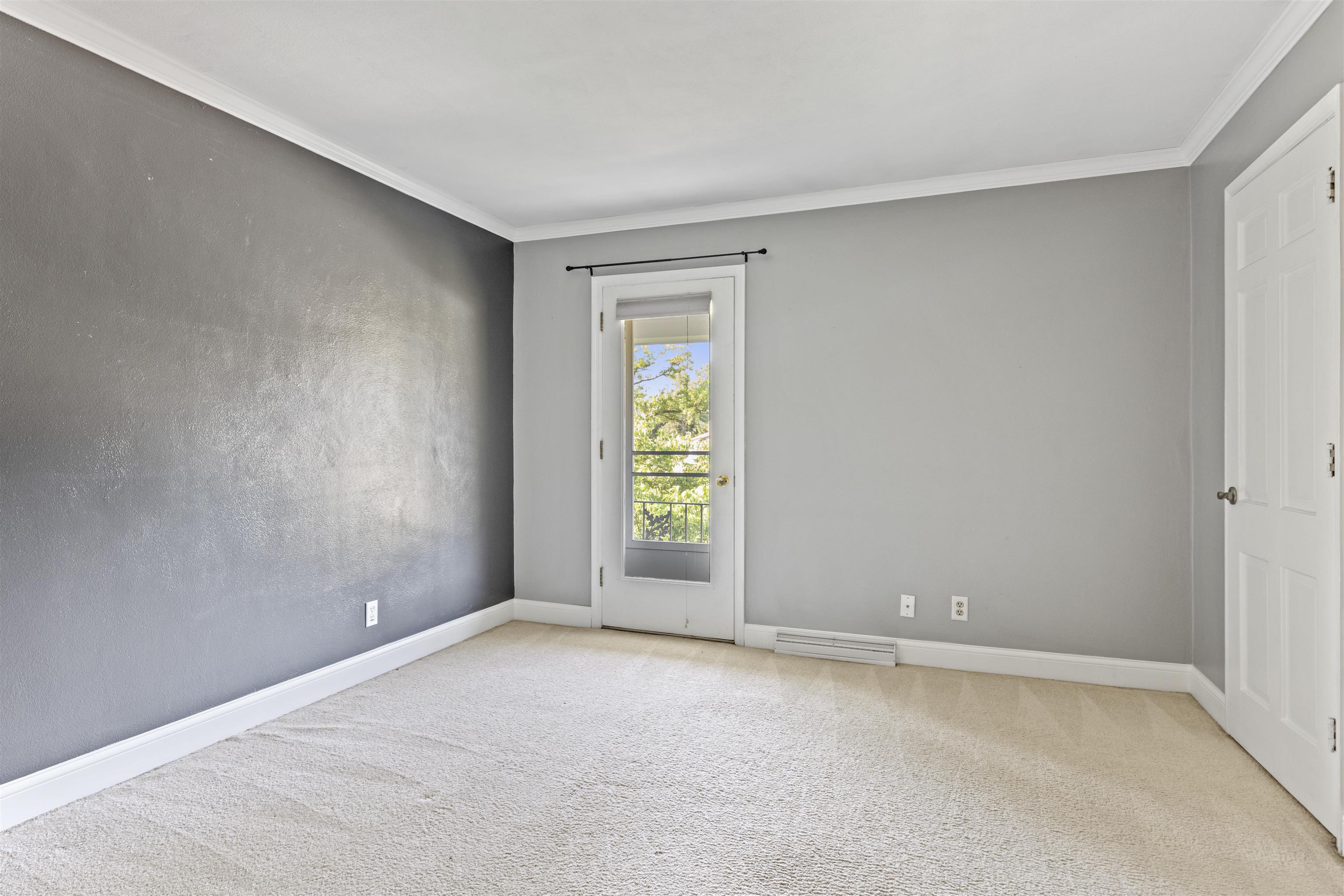 4976 Brigadoon Road Rockford, IL 61107 - Photo 18 of 32 a view of an empty room with a window