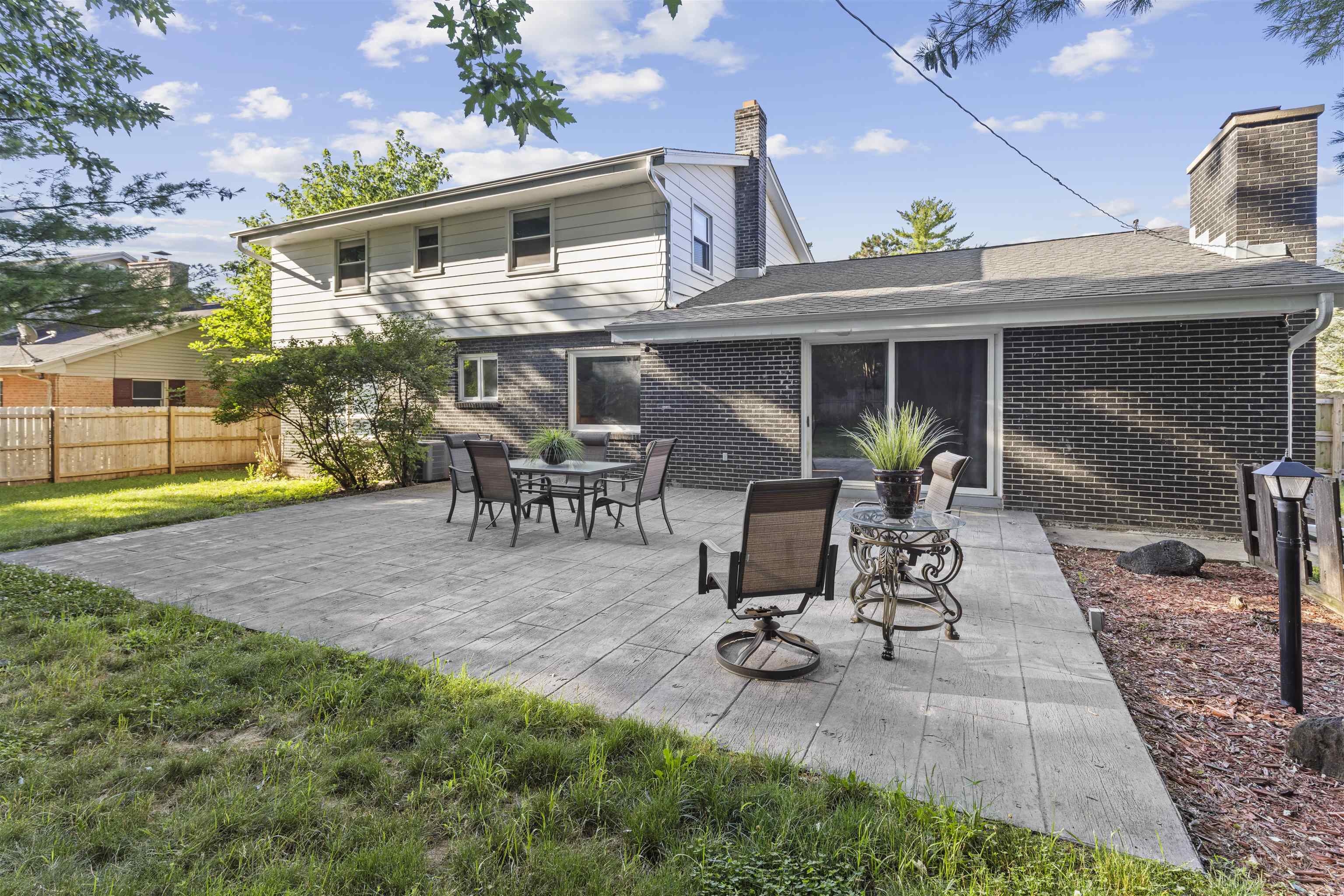 4976 Brigadoon Road Rockford, IL 61107 - Photo 28 of 32 a view of a backyard with patio