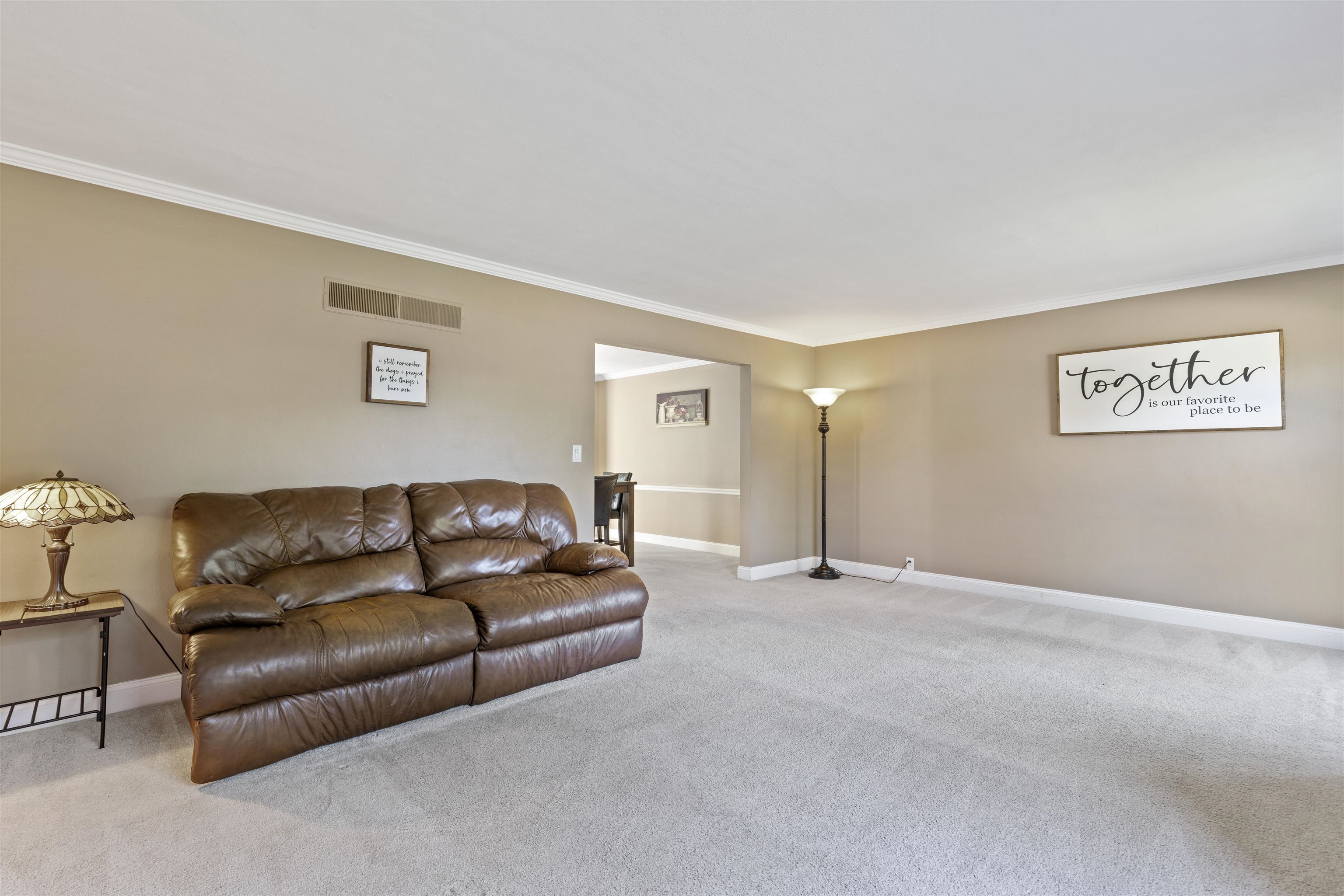 4976 Brigadoon Road Rockford, IL 61107 - Photo 3 of 32 a living room with furniture and a window