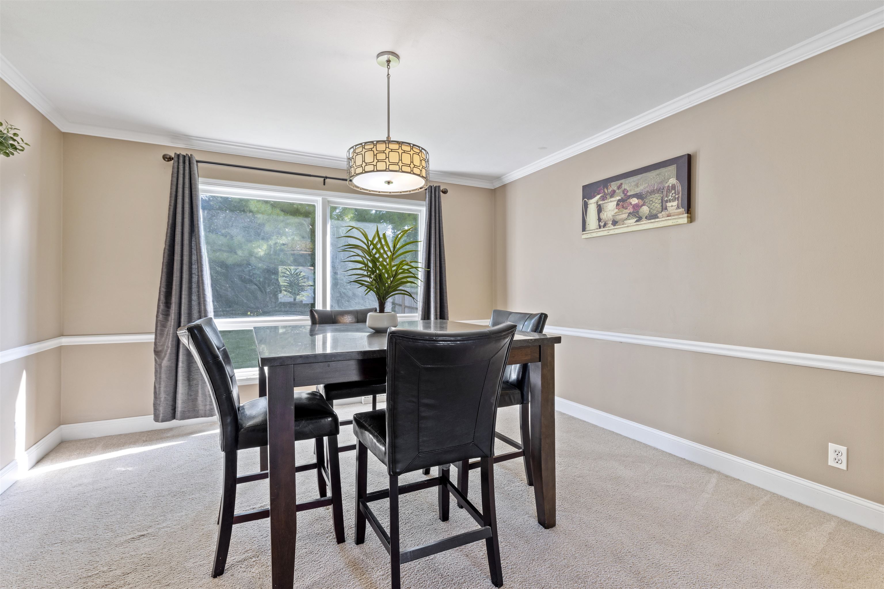 4976 Brigadoon Road Rockford, IL 61107 - Photo 5 of 32 a view of a dining room with furniture window and outside view