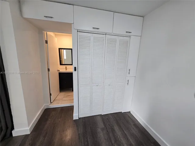 a kitchen with a stove and a microwave