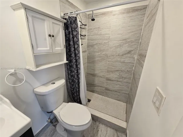 a view of wooden floor and wooden floor in a room
