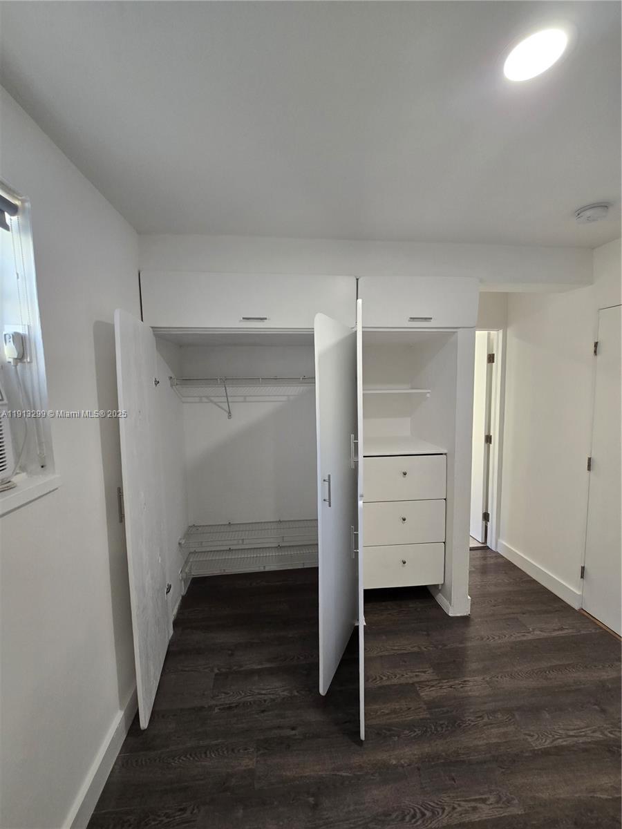 1629 Southwest 6th Street, Unit 13 Miami, FL 33135 - Photo 59 of 74 wooden floor in an empty room