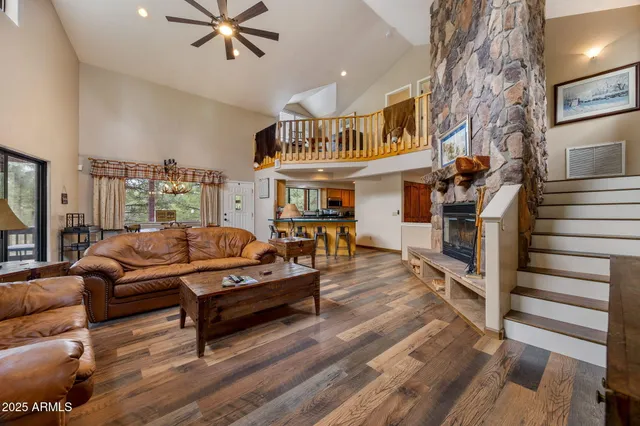 a view of balcony with wooden floor